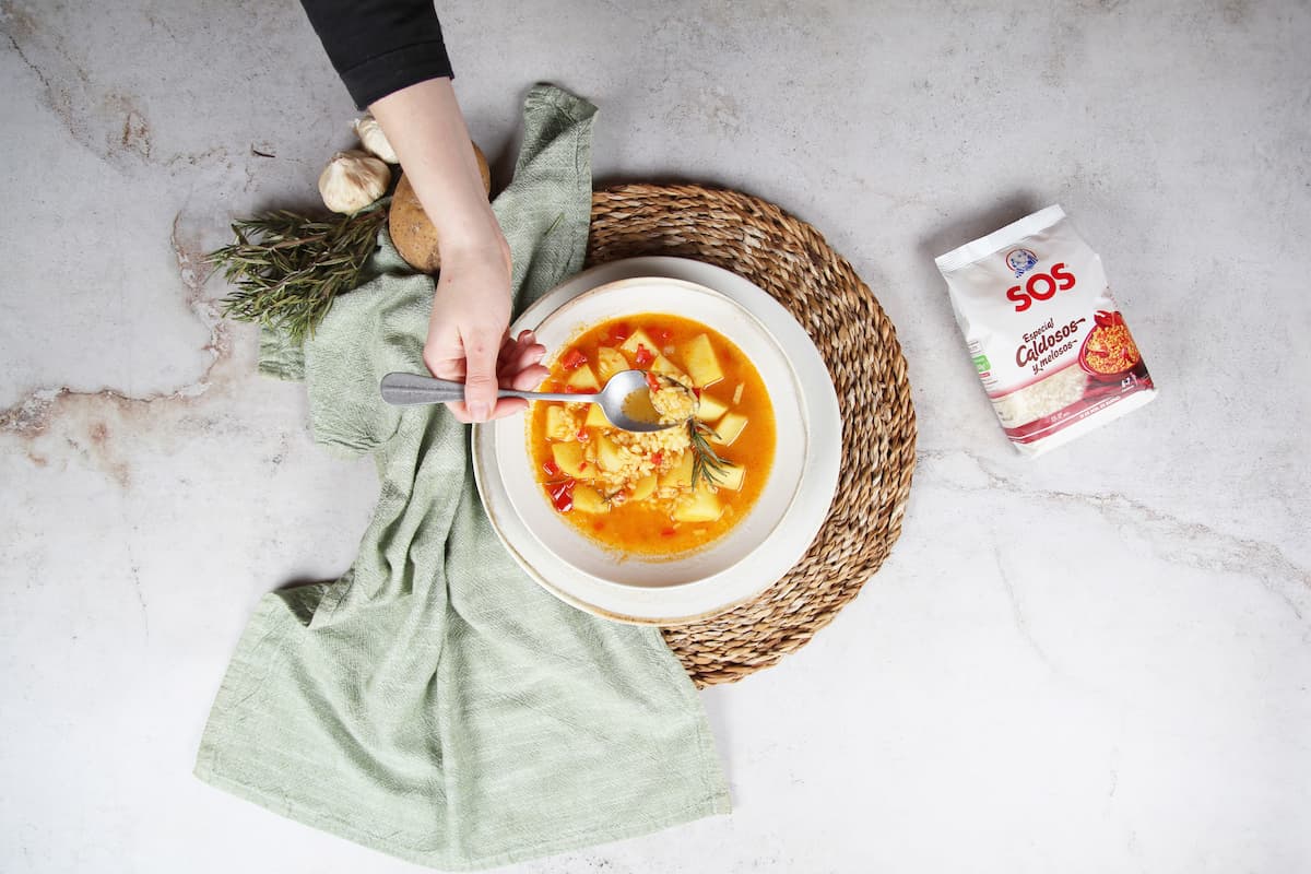 Paso 10 de la receta Arroz caldoso con patatas y romero