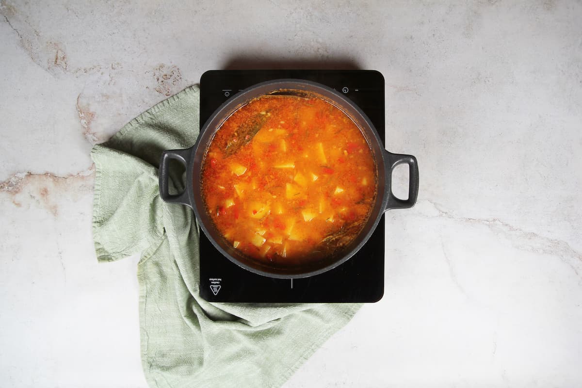 Paso 8 de la receta Arroz caldoso con patatas y romero